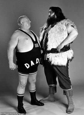 5034406-6274395-Stars_including_Big_Daddy_left_and_Giant_Haystacks_right_lit_up_-a-2_1539516432658